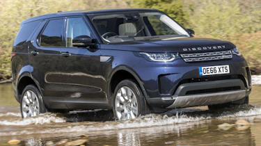 Land Rover Discovery wading through water