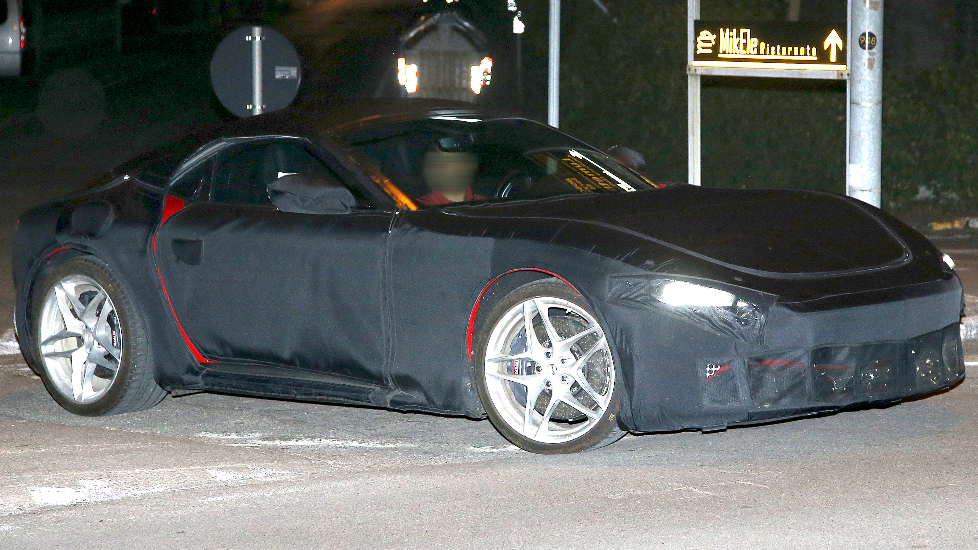 Ferrari Roma Spider (camouflaged) - side/front angled