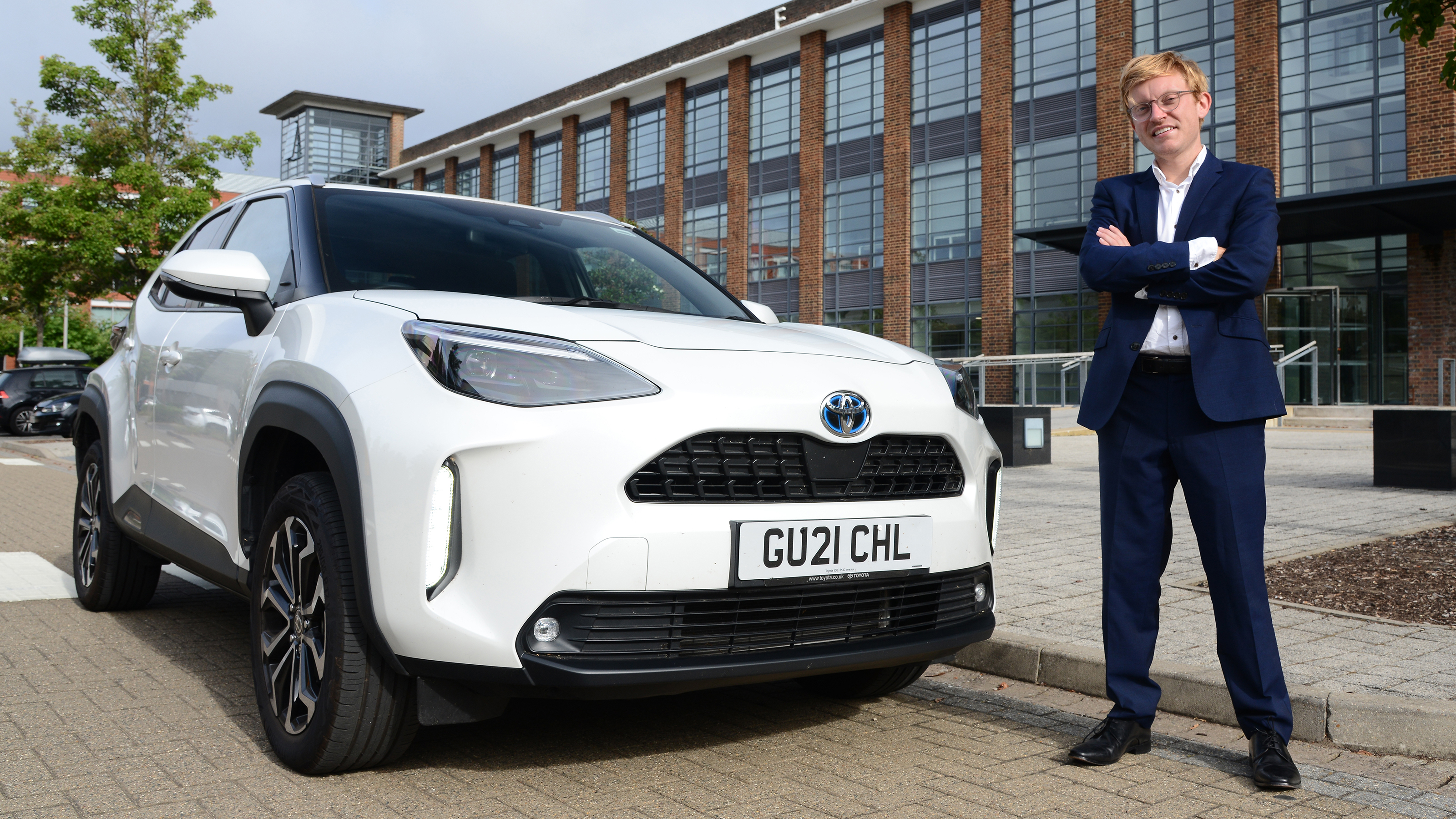 Toyota Yaris Cross final report - James Brodie standing with Yaris Cross