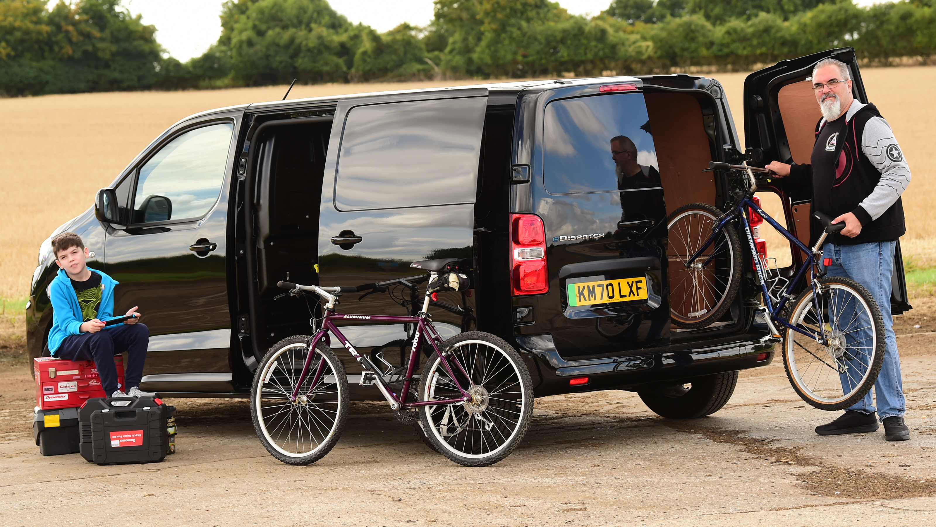 Dean Gibson and son loading bikes into Citroen e-Dispatch