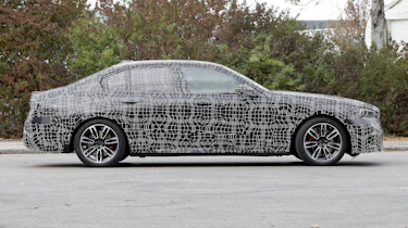 2023 BMW 5 Series (camouflaged) - side