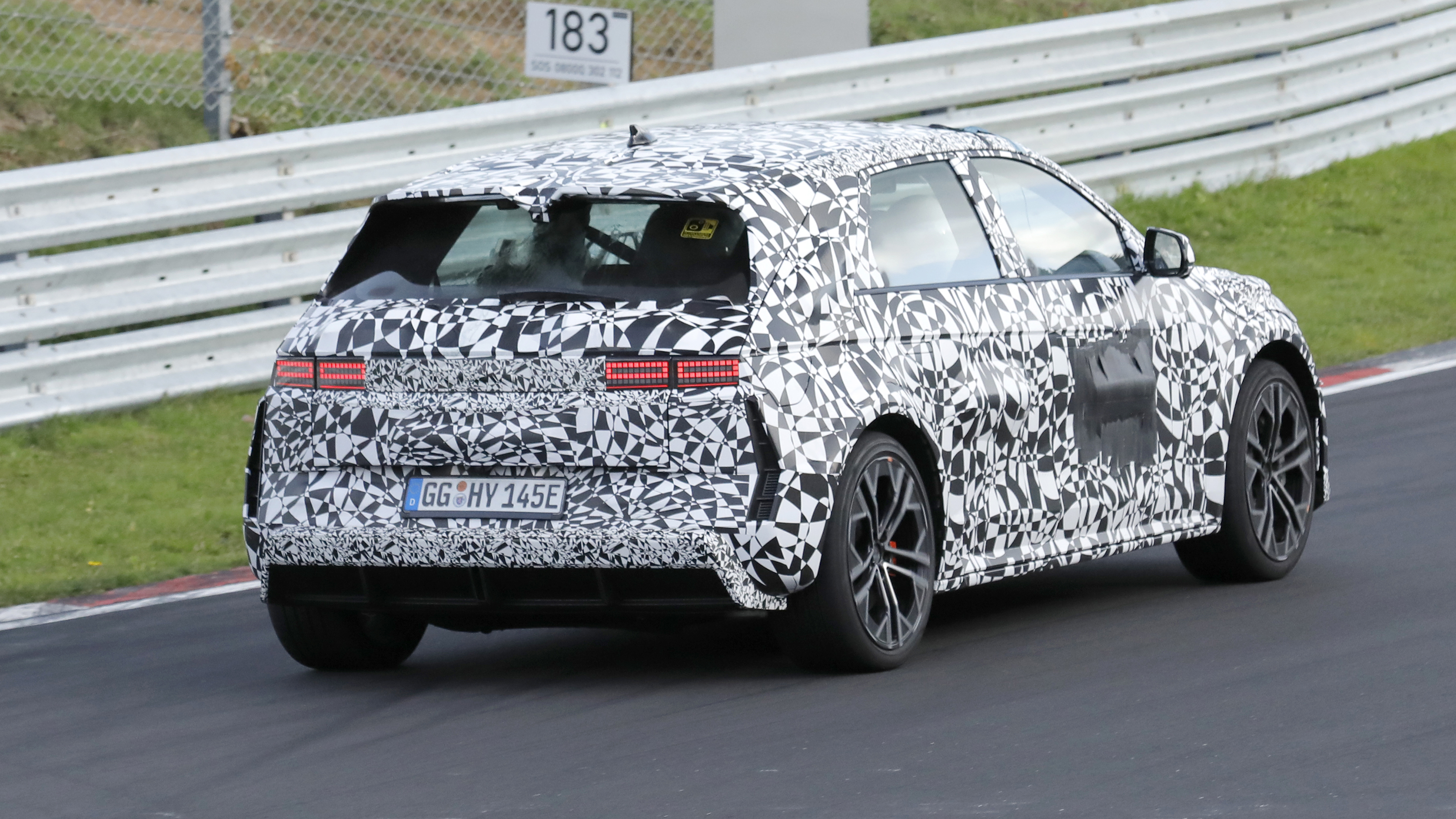 Hyundai Ioniq 5 N (camouflaged) - rear cornering on track