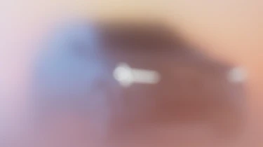 Volvo EX90 blurred teaser image - front