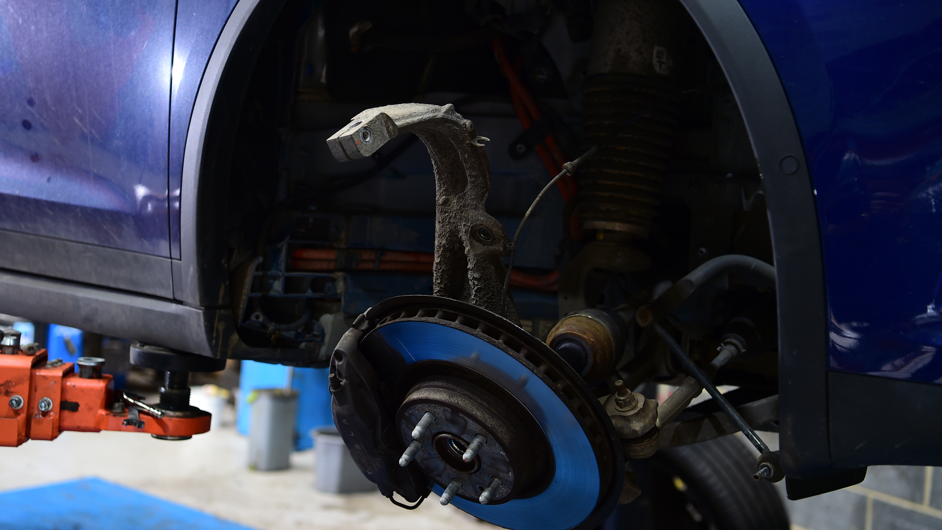 Electric car servicing brakes