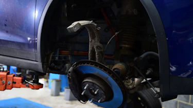 Electric car servicing brakes