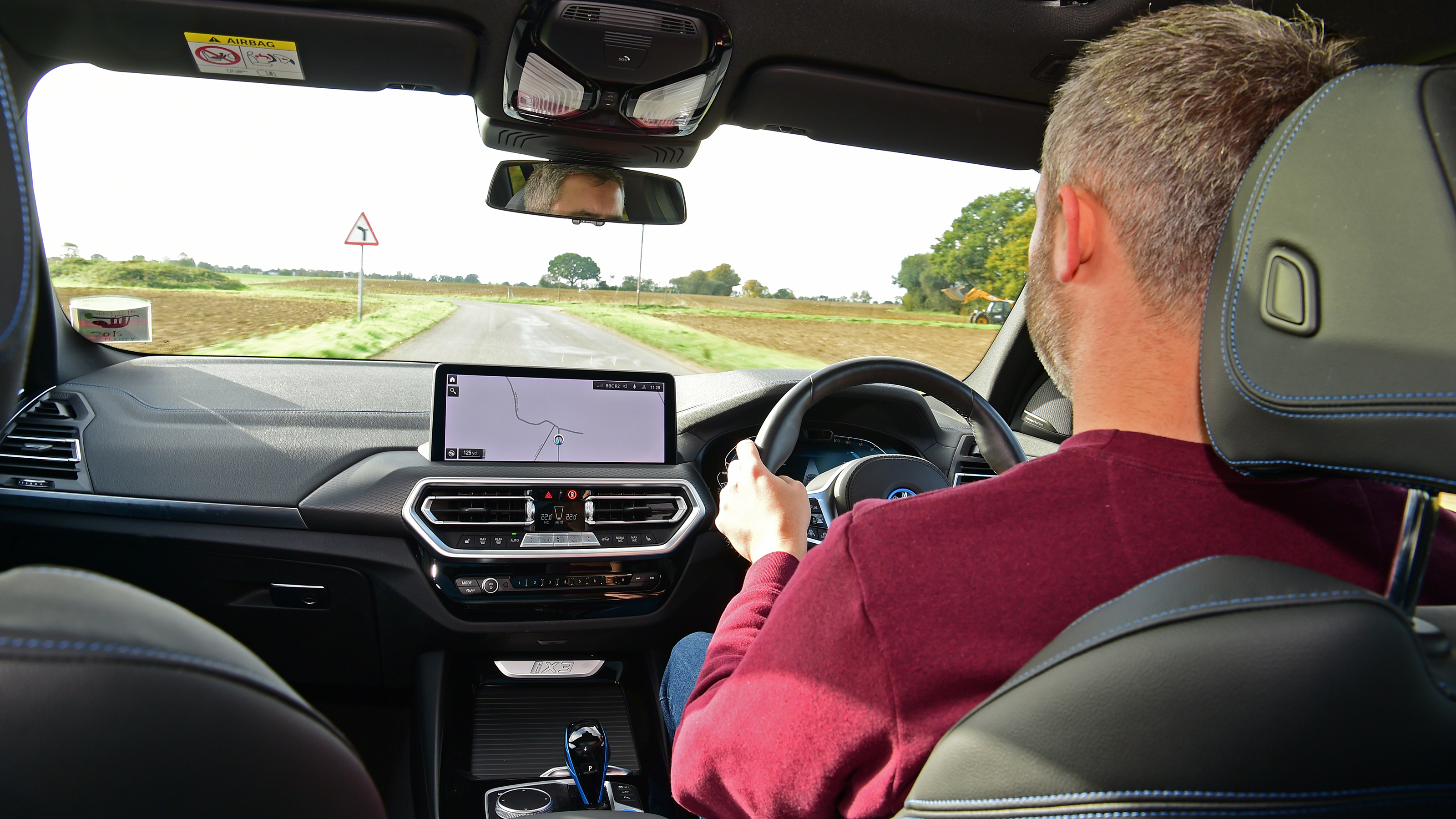 BMW iX3 - over-shoulder driving