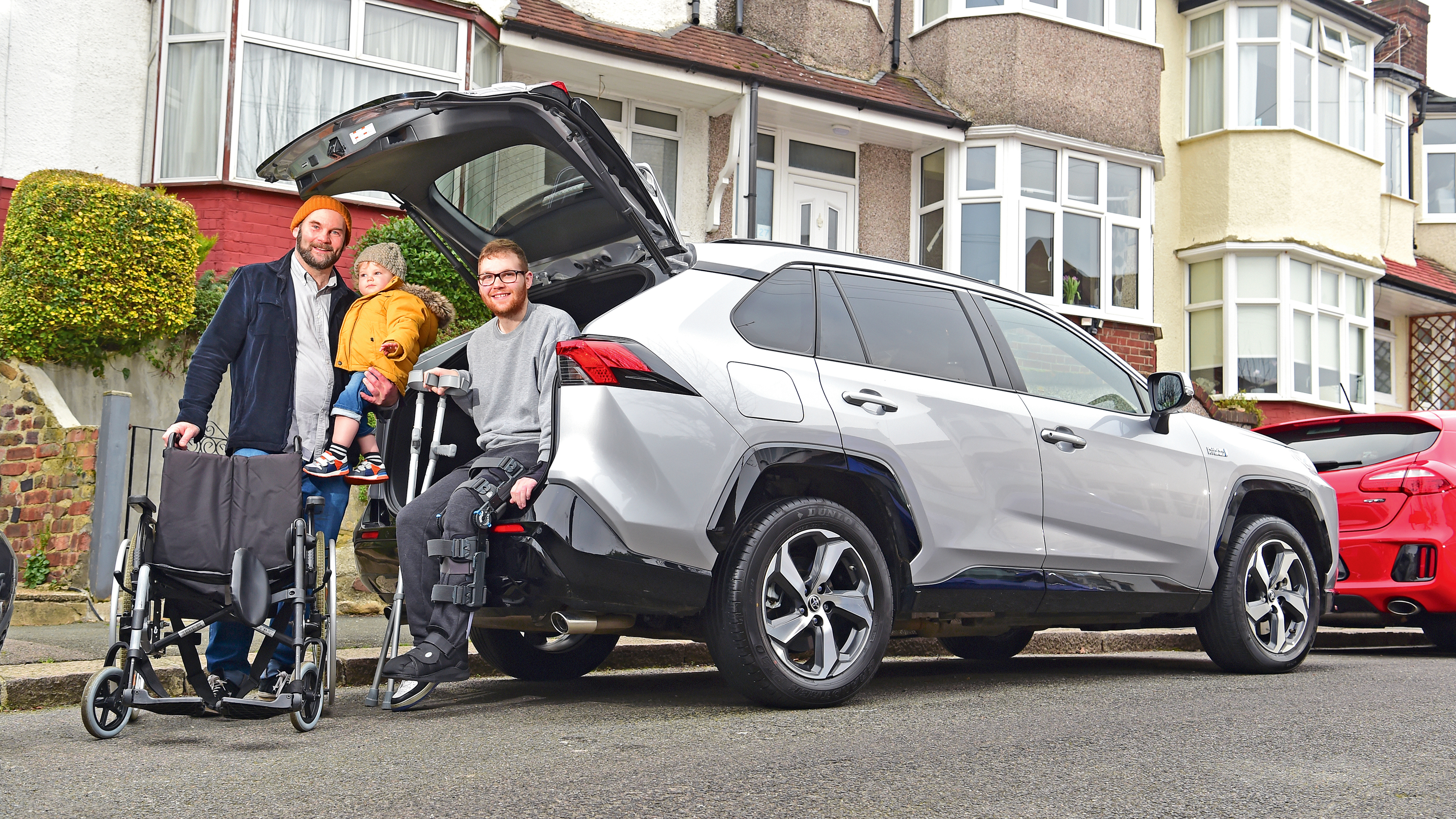 Darren Wilson and family with his Toyota RAV4