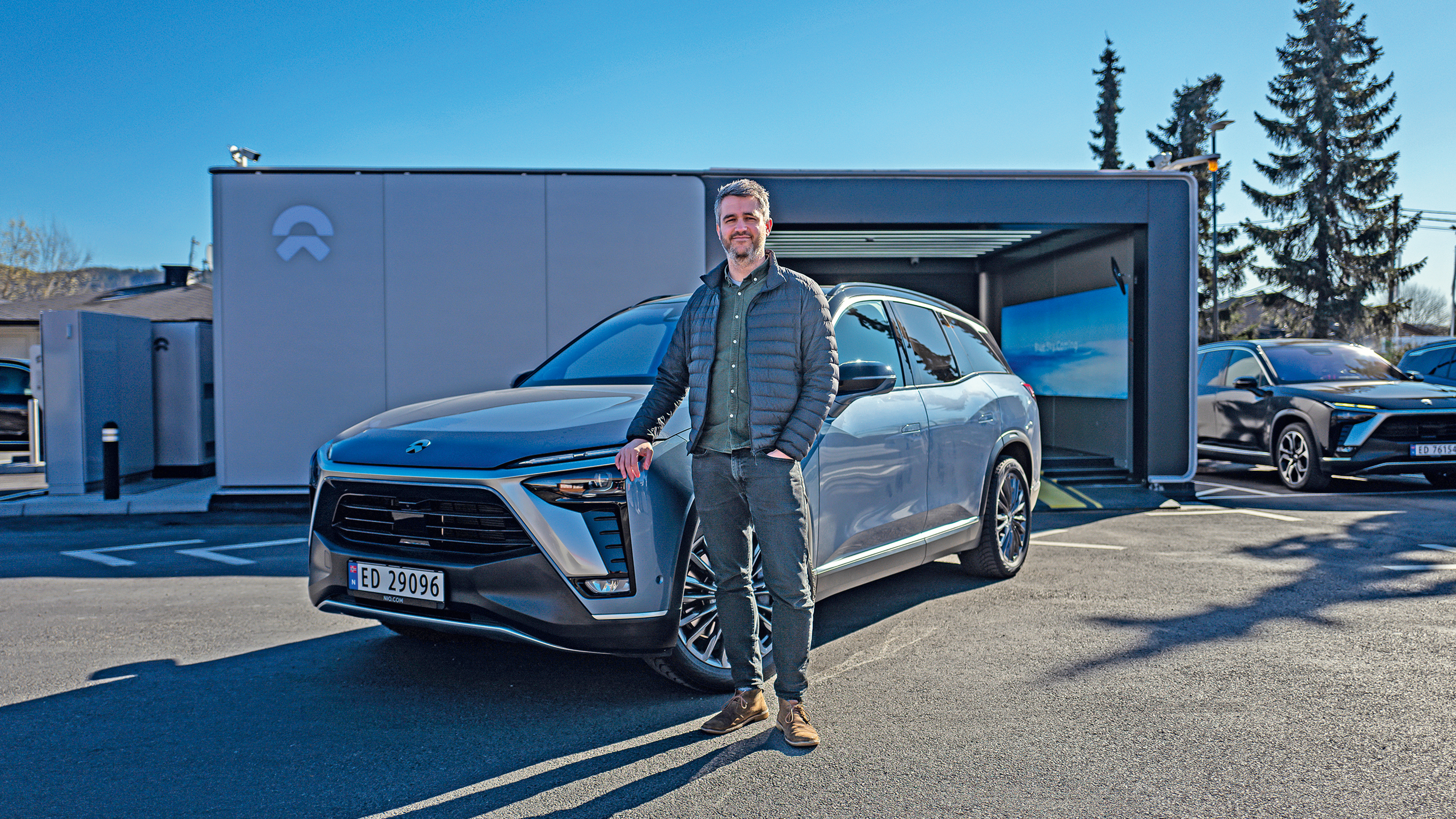 Richard Ingram with standing Nio ES8 SUV