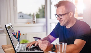 Person browsing on laptop