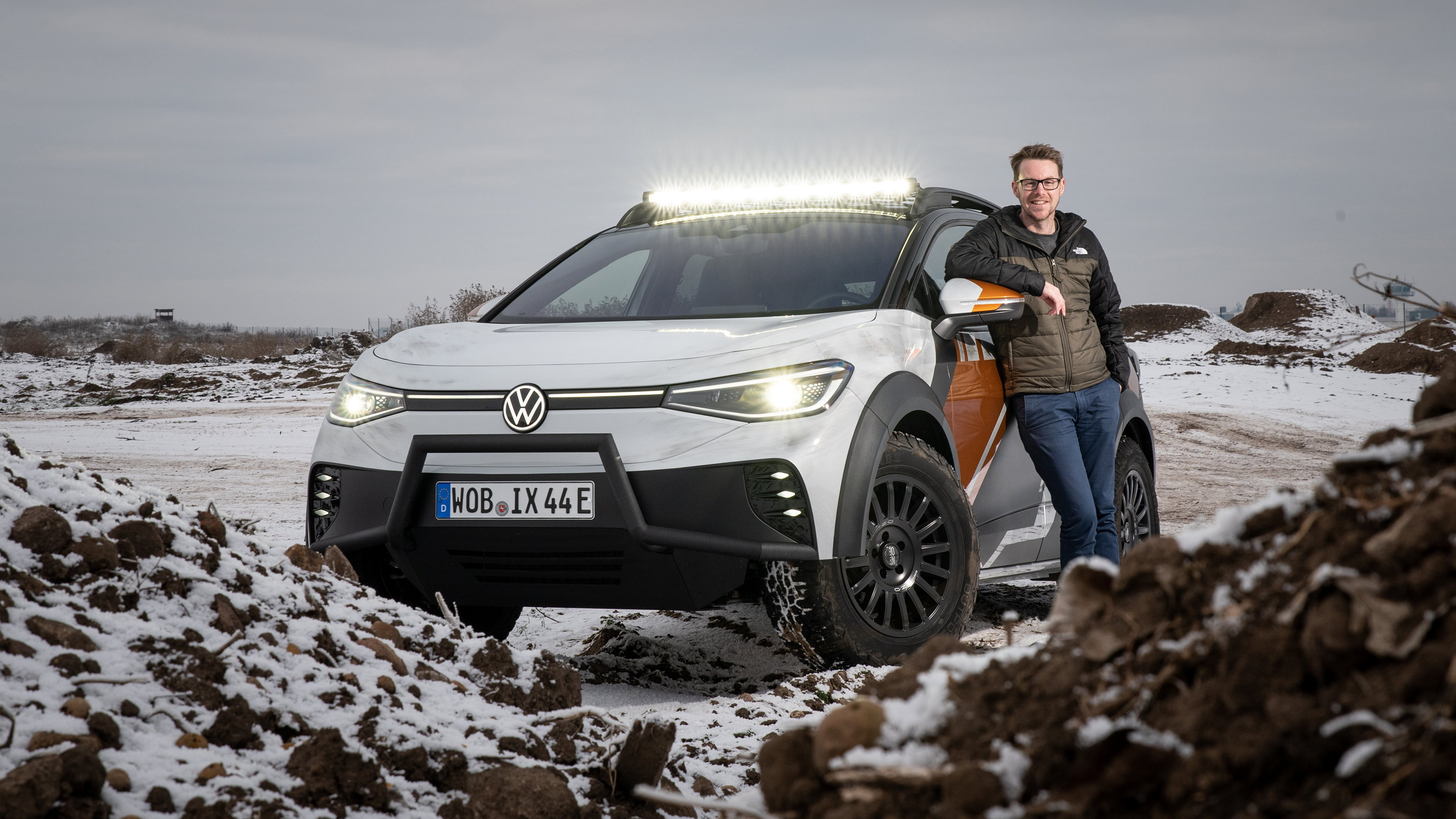 Volkswagen ID Xtreme - Sean Carson standing with ID Xtreme in snow