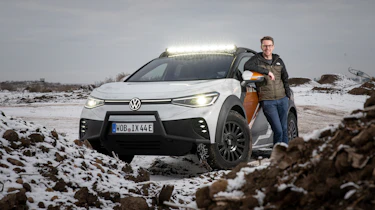 Volkswagen ID Xtreme - Sean Carson standing with ID Xtreme in snow