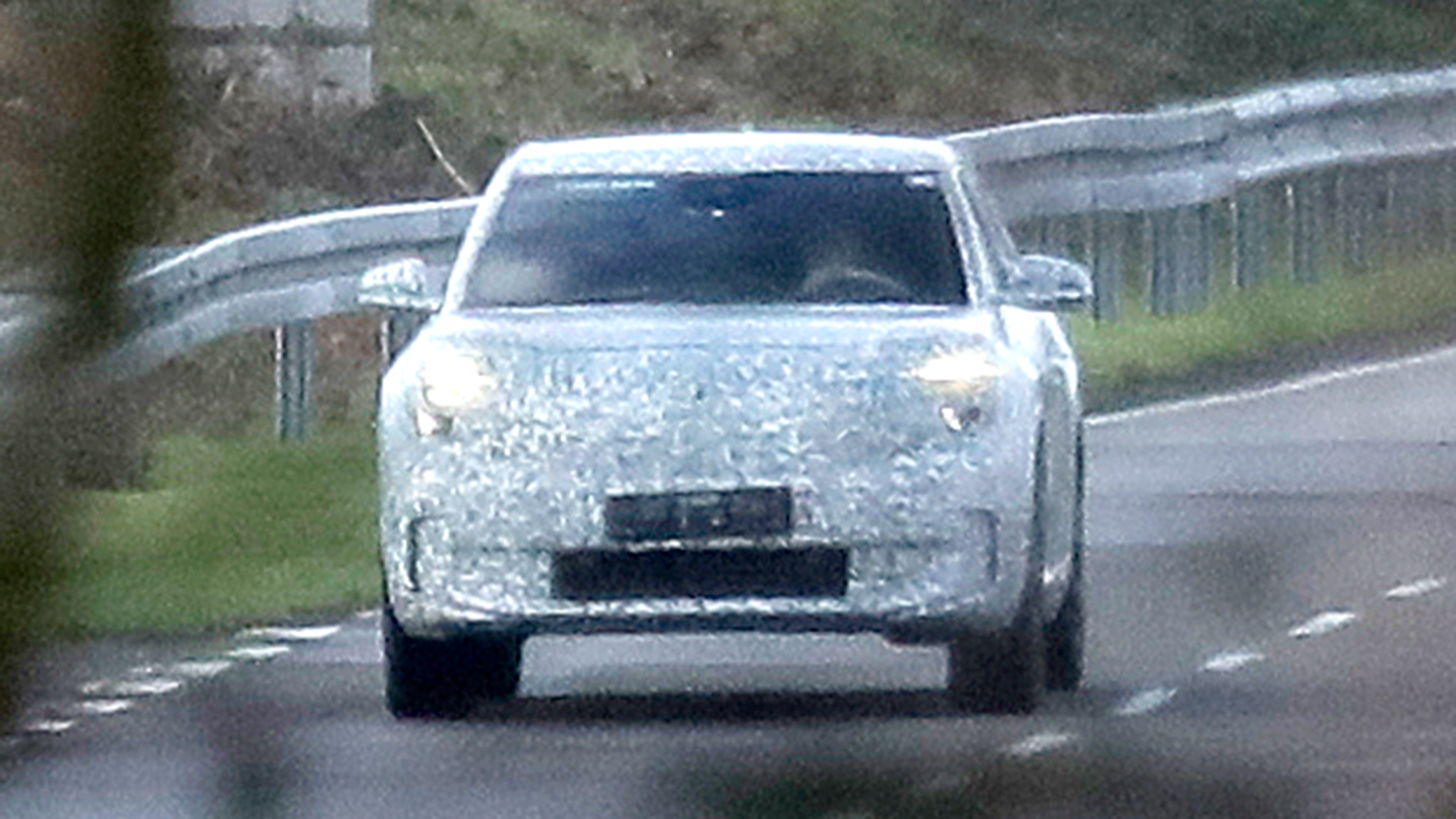 Ford EV SUV (camouflaged) spyshot - front