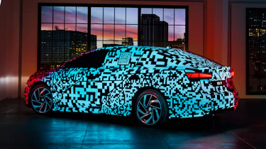 Volkswagen ID7 camouflage - rear static