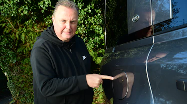 Land Rover Defender long-termer - Steve Fowler pressing fuel filler cap