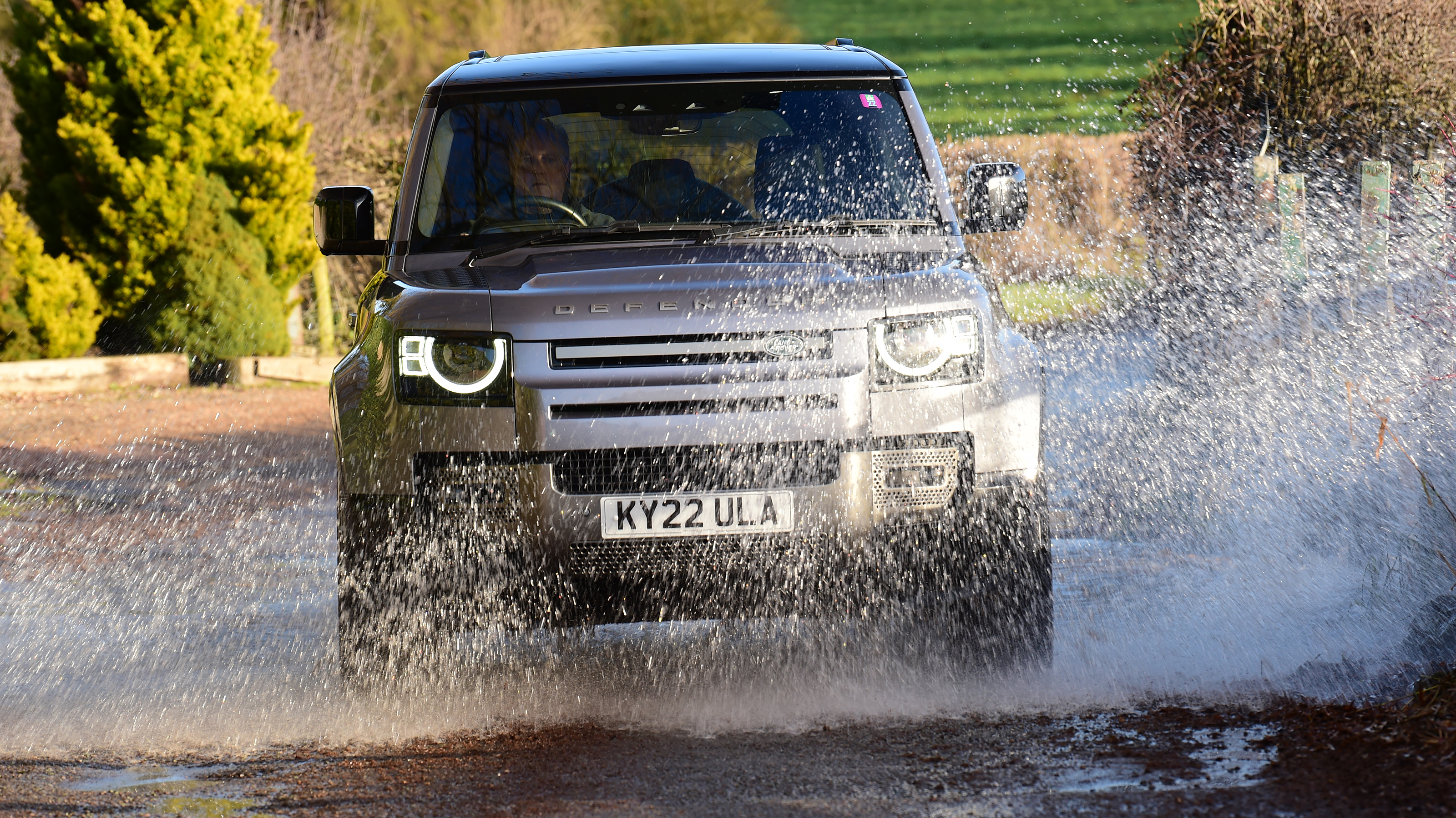 Land Rover Defender long-termer - driving through ford (front)