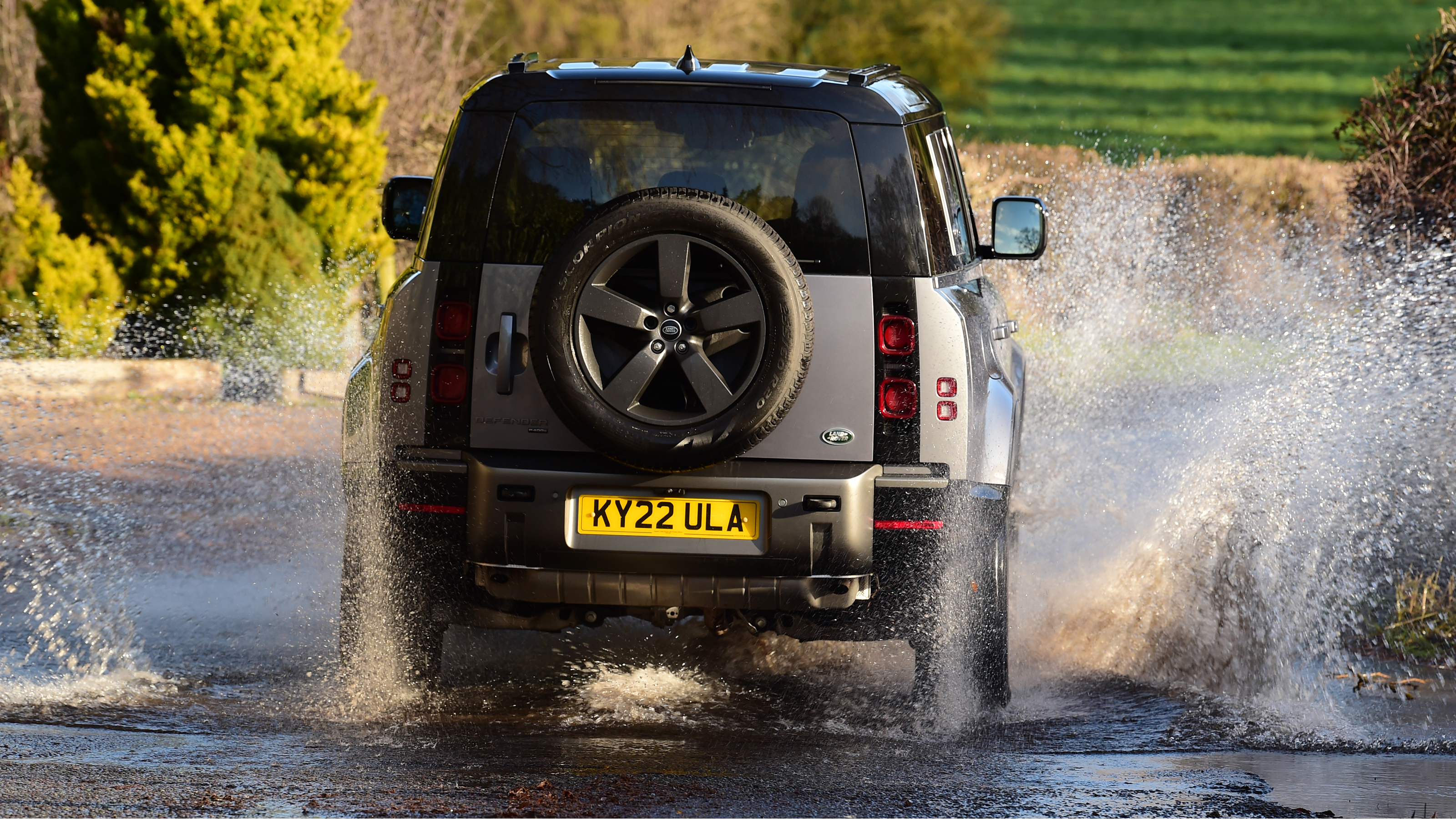 Land Rover Defender long-termer - driving through ford (rear)