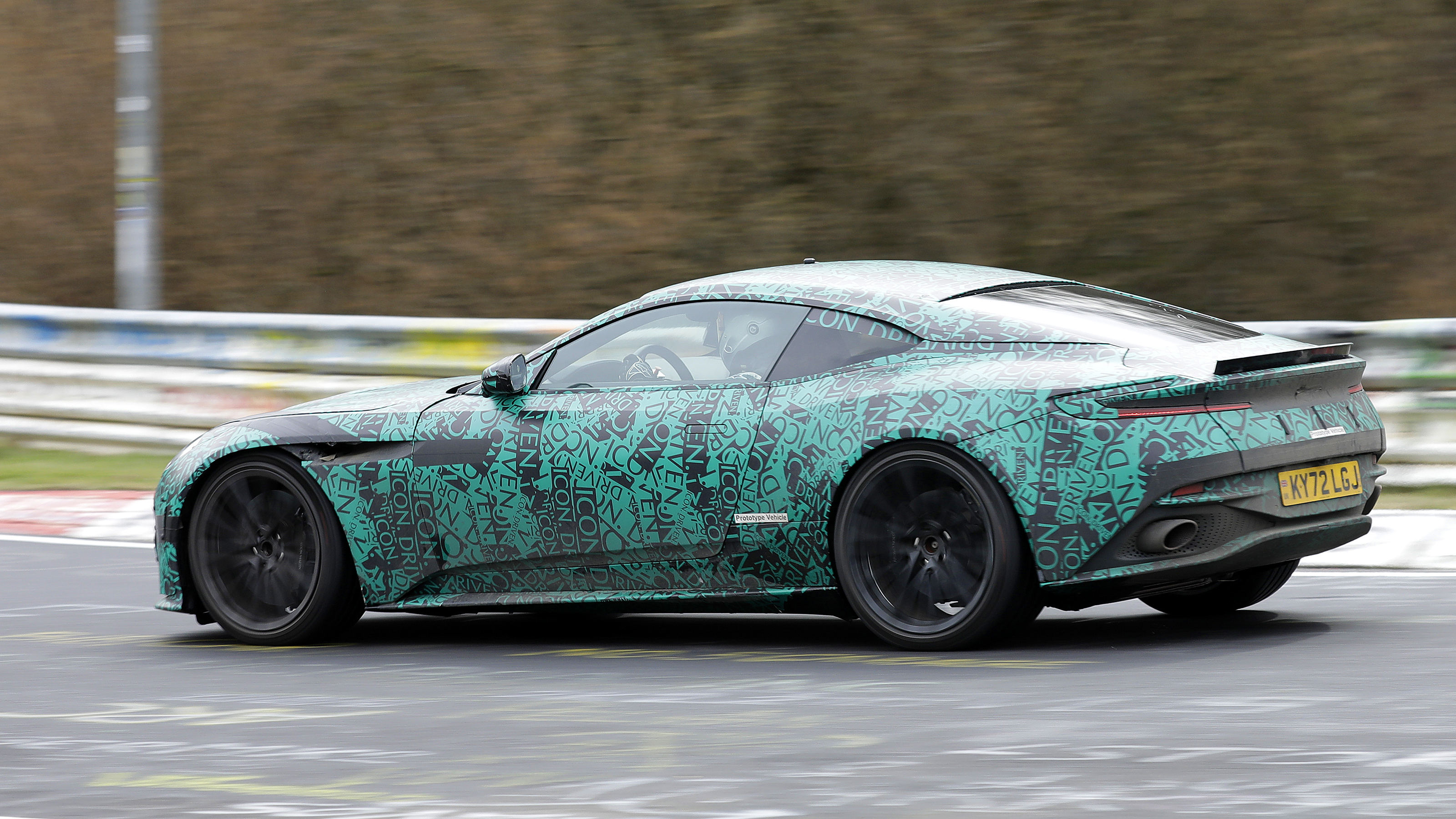 Aston Martin DB12 spy shots Nurburgring side