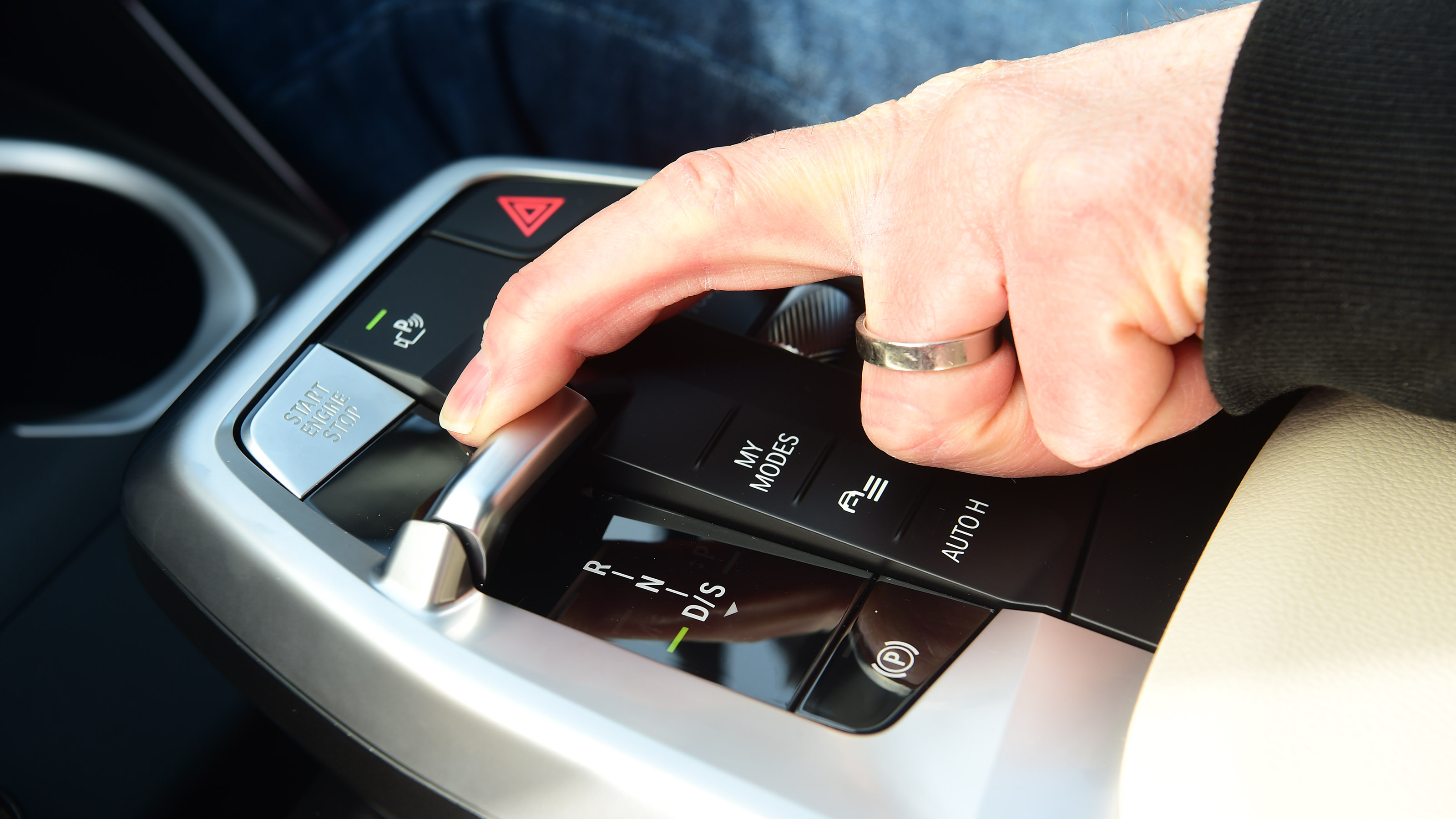 Auto Express special contributor Steve Sutcliffe operating the BMW X1's gear selector