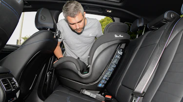 BMW iX3 M Sport Pro - rear seats feat. child seat