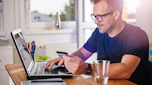 Person browsing on a laptop