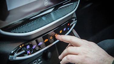 Maxus T90EV - Dean Gibson operating touch-sensitive switchgear