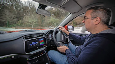 Maxus T90EV - Dean Gibson driving (over shoulder view)