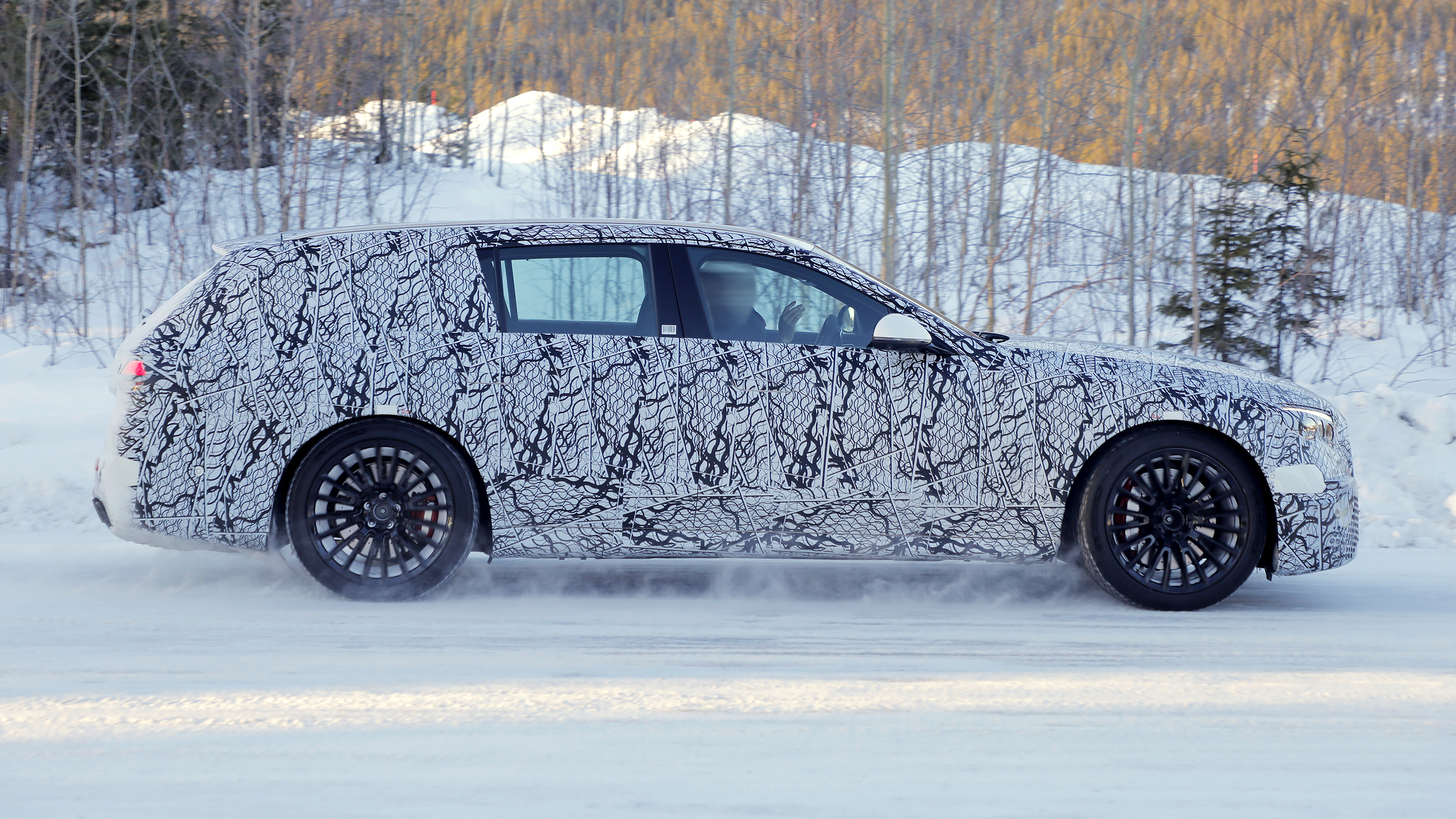 Mercedes E-Class AMG estate (camouflaged) - side
