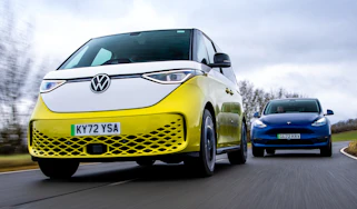 Tesla Model Y chasing Volkswagen ID.Buzz
