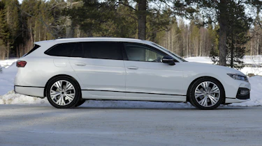 Volkswagen Passat estate (white with camouflage) - side