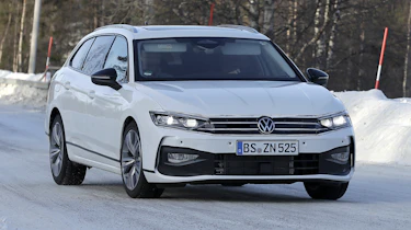 Volkswagen Passat estate (white with camouflage) - front