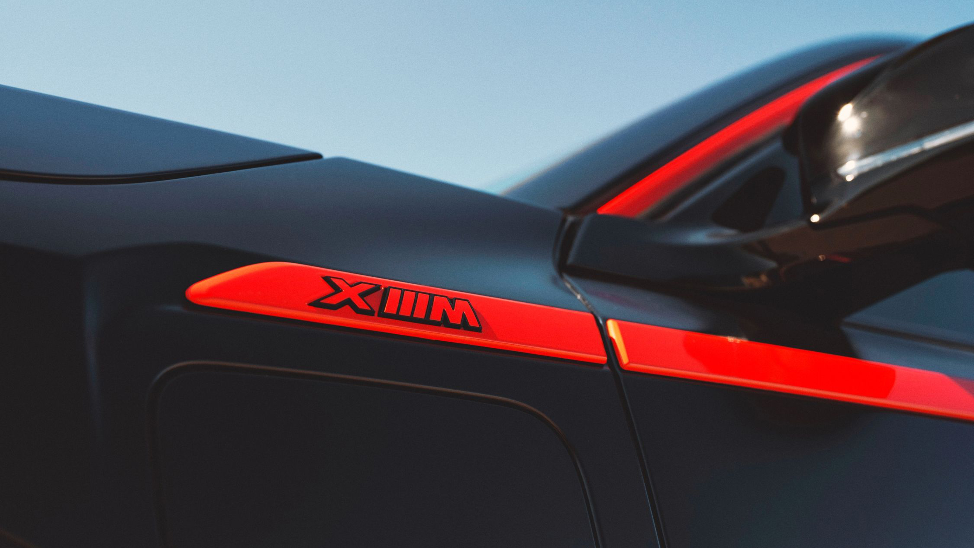 BMW XM Label Red - front wing badge