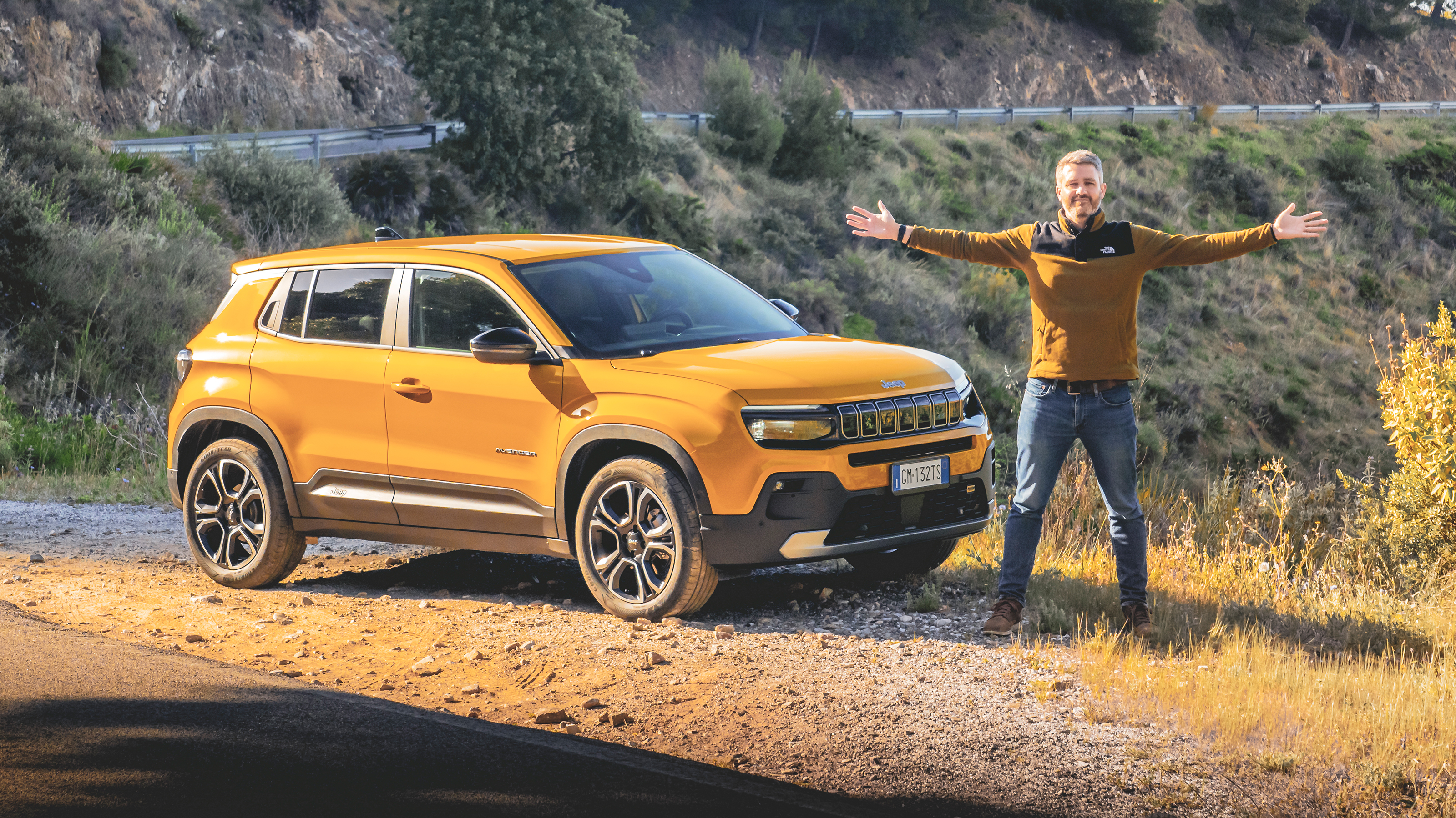 Richard Ingram standing next to Jeep Avenger