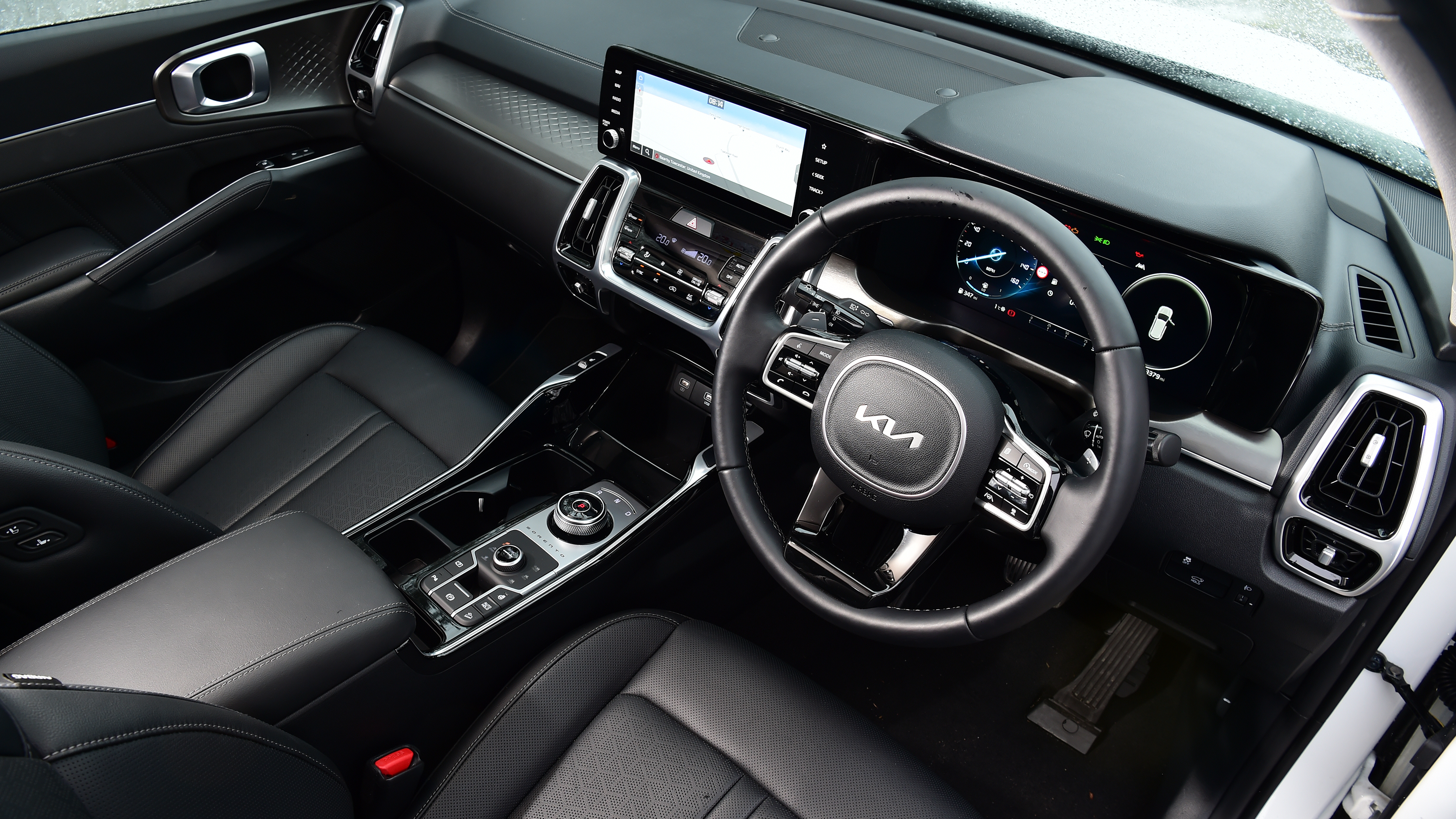 Kia Sorento - interior (driver's door view)