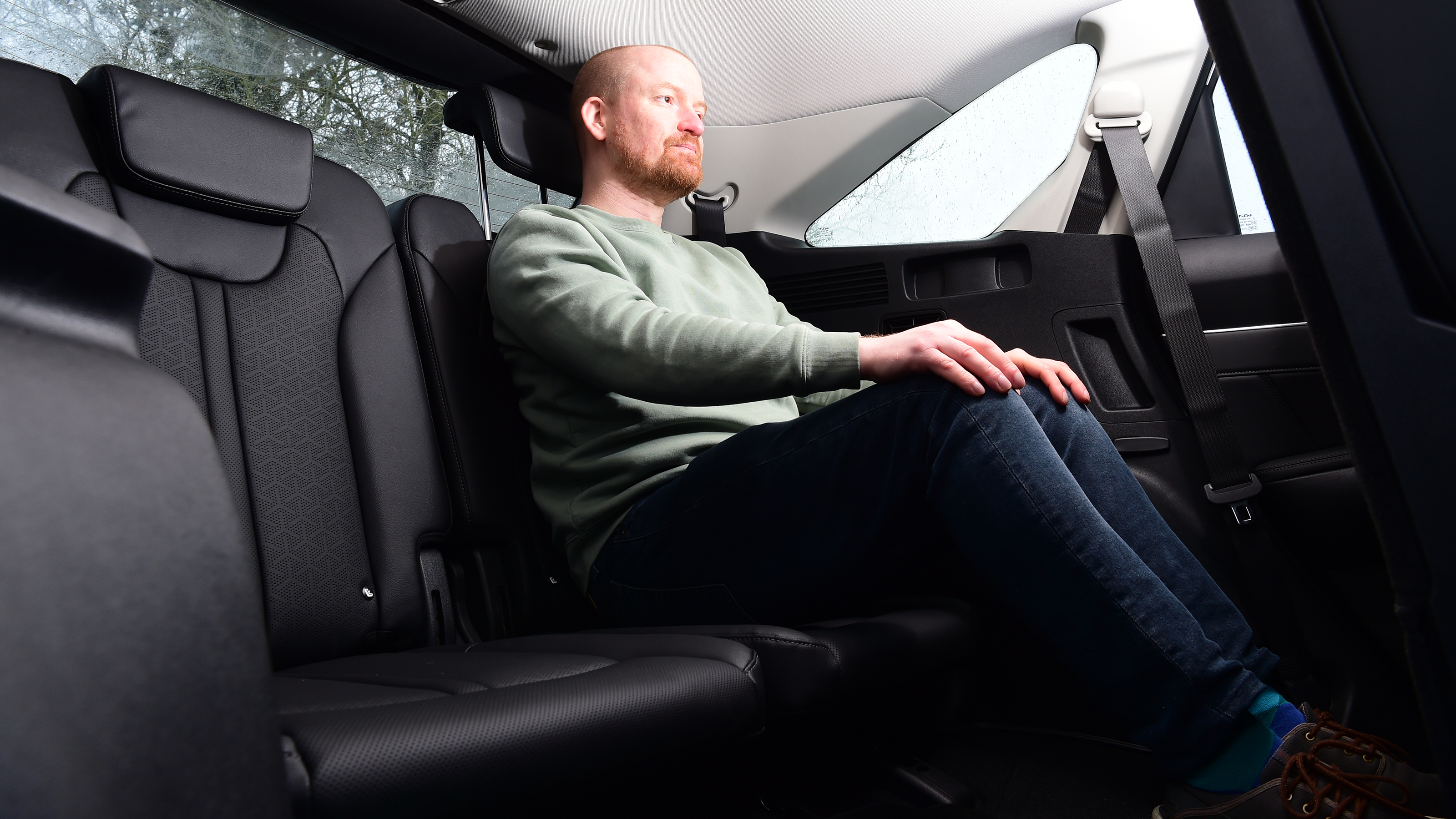 Kia Sorento - Alex Ingram sitting in back seat