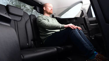 Kia Sorento - Alex Ingram sitting in back seat