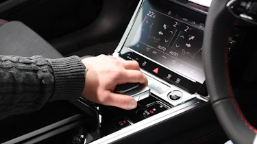Auto Express chief reviewer Alex Ingram operating Audi Q8 e-tron gear selector