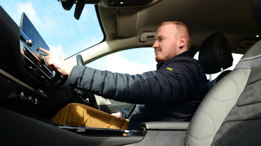 Auto Express Reviews Editor Ellis Hyde operating Citroen C5 x infotainment touchscreen