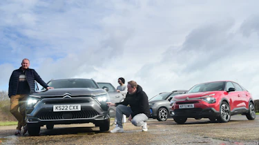 Ellis Hyde, Pete Baiden and Jordan Katsianis inspecting Citroen C5 X