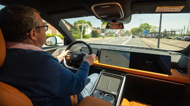 Auto Express deputy editor John McIlroy driving Xpeng G9 (over-shoulder view)