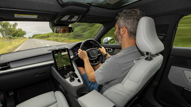 Driving Electric and Carbuyer editor Richard Ingram driving the 2023 Polestar 2