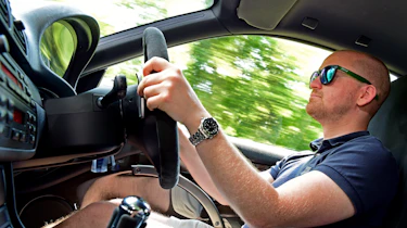 Auto Express chief reviewer Alex Ingram driving the BMW M3 CSL