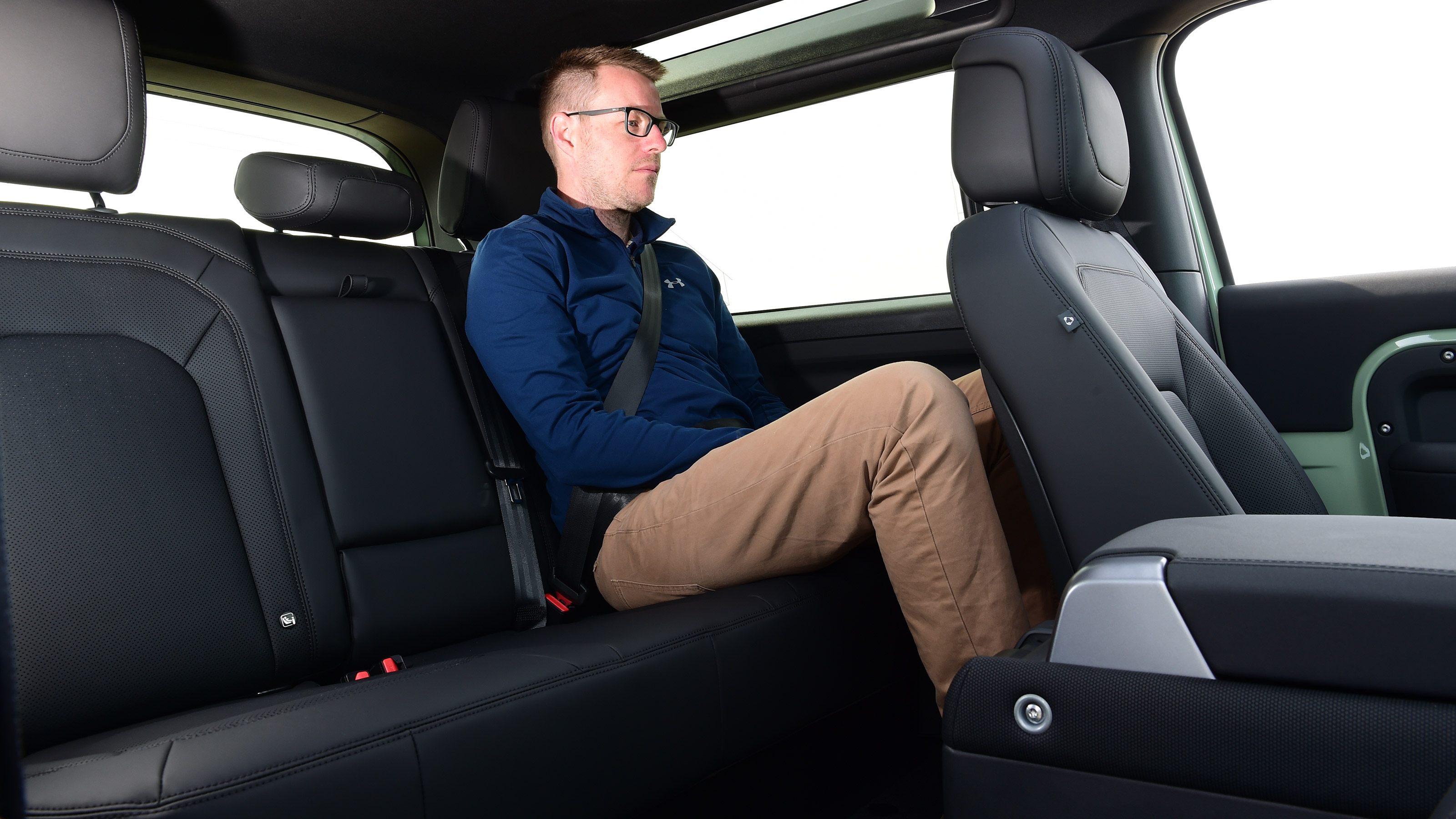 Sean Carson sitting in the Land Rover Defender 75th Limited Edition