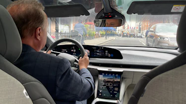 Auto Express editor-in-chief Steve Fowler driving the Lucid Air