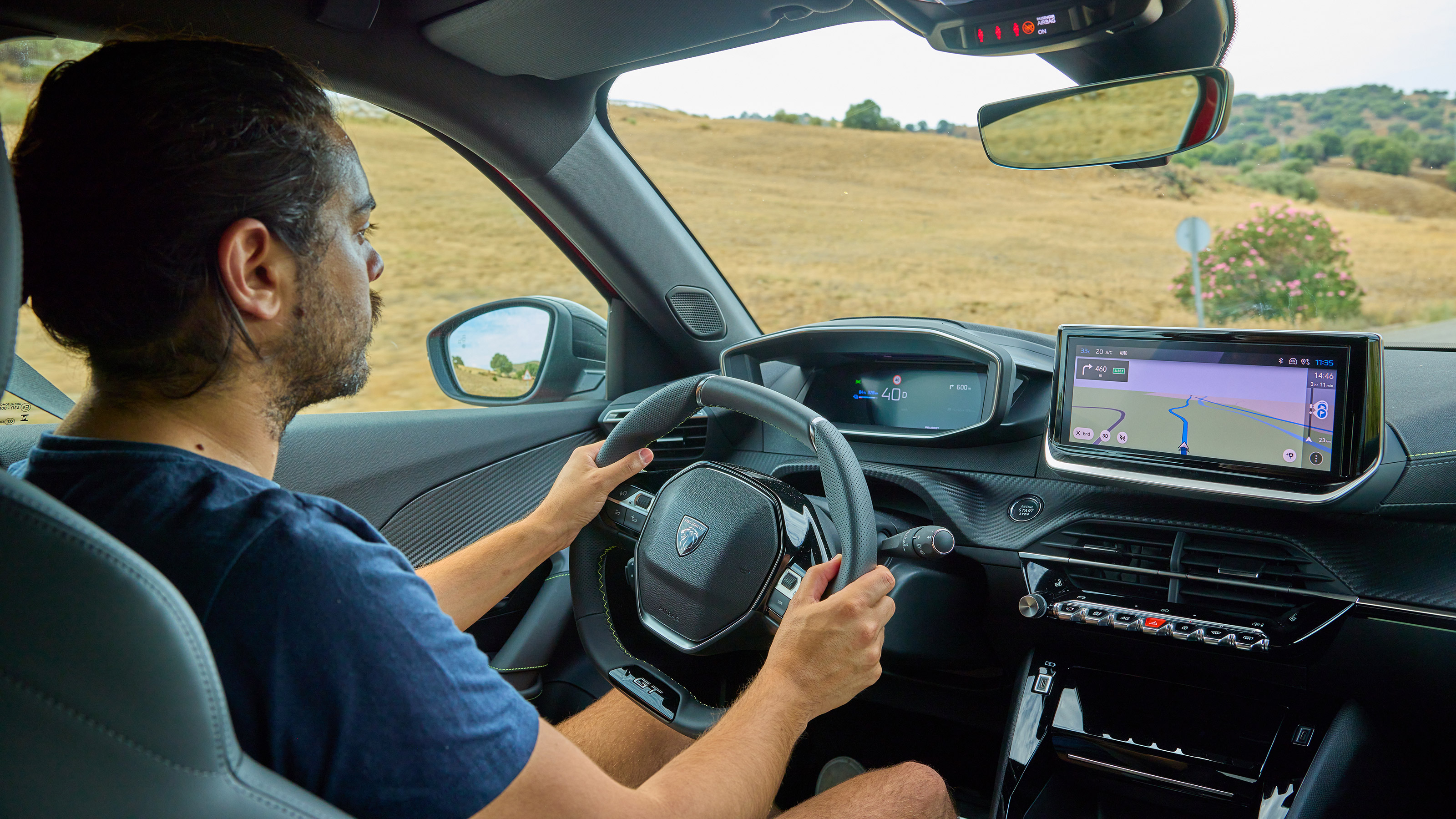 Jordan Katsianis driving the Peugeot e-2008