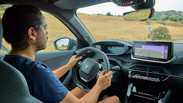 Jordan Katsianis driving the Peugeot e-2008