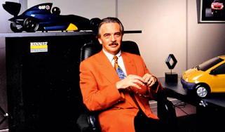 Patrick le QuEment sitting down in an office - front shot.