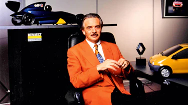 Patrick le QuEment sitting down in an office - front shot.