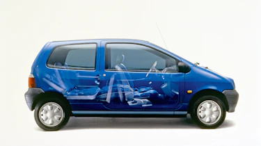 A side view of a blue Renault Twingo.