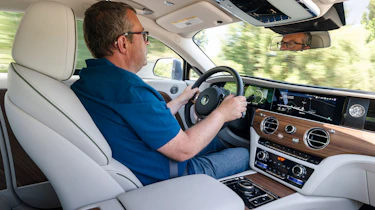 John McIlroy driving the Rolls-Royce Spectre