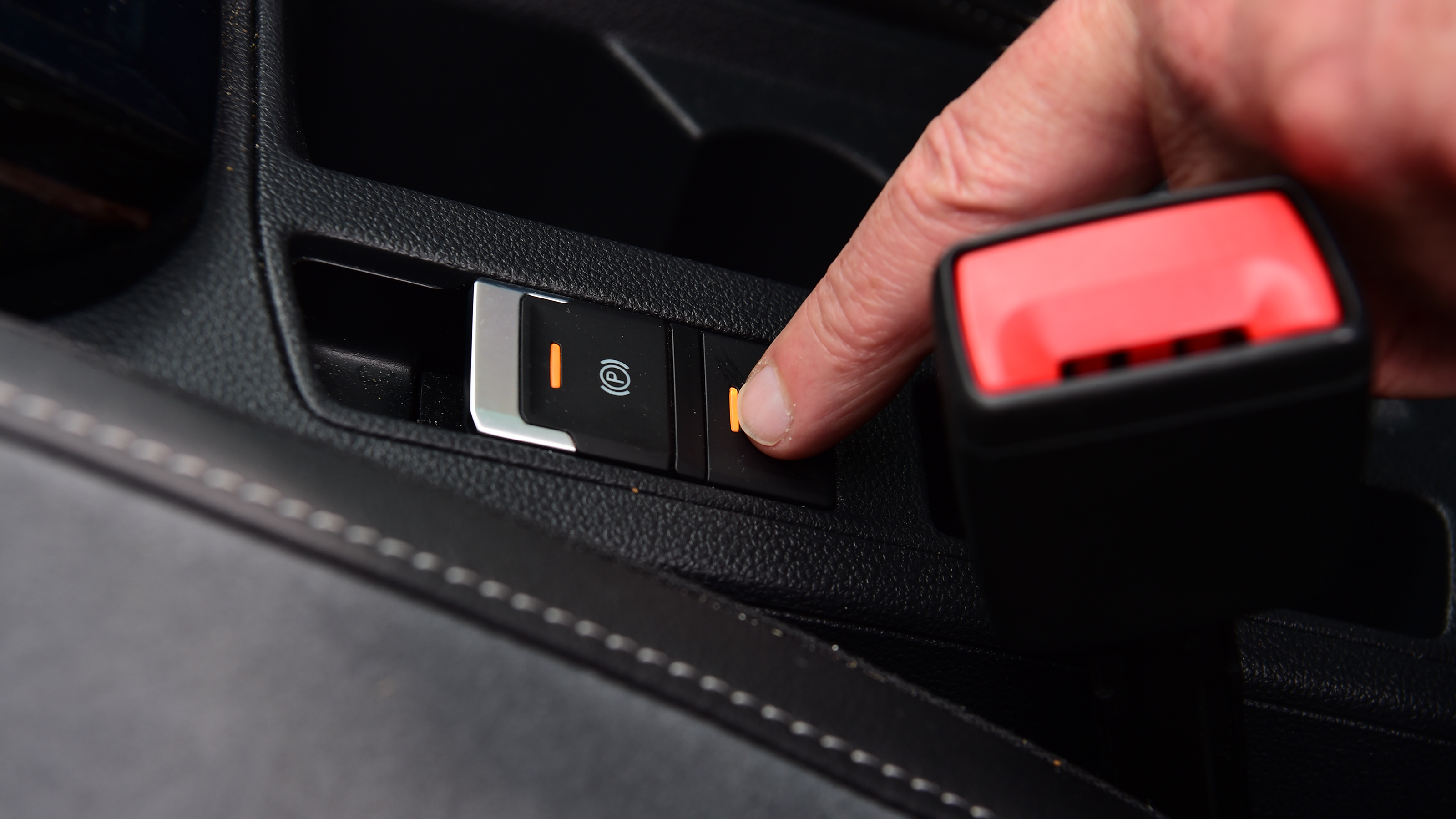Volkswagen T-Cross - operating handbrake switch